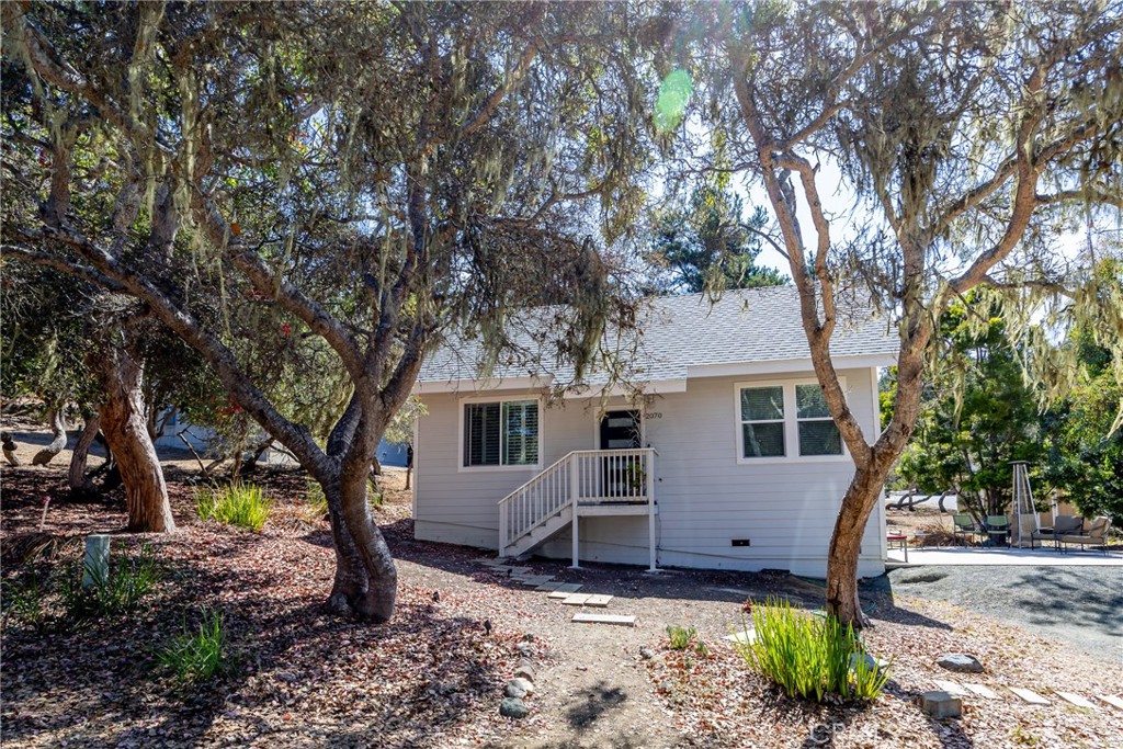 2070 Wales Road Cambria, CA 93428 - Photo 36 of 38 a view of a house with a yard
