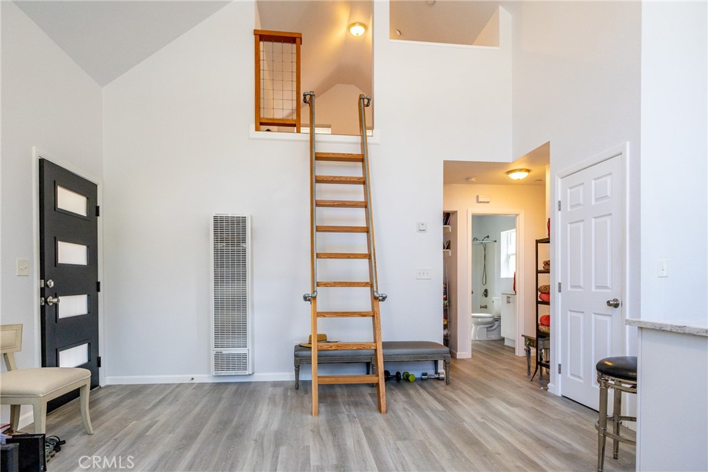 2070 Wales Road Cambria, CA 93428 - Photo 6 of 38 a view of a room with wooden floor and furniture