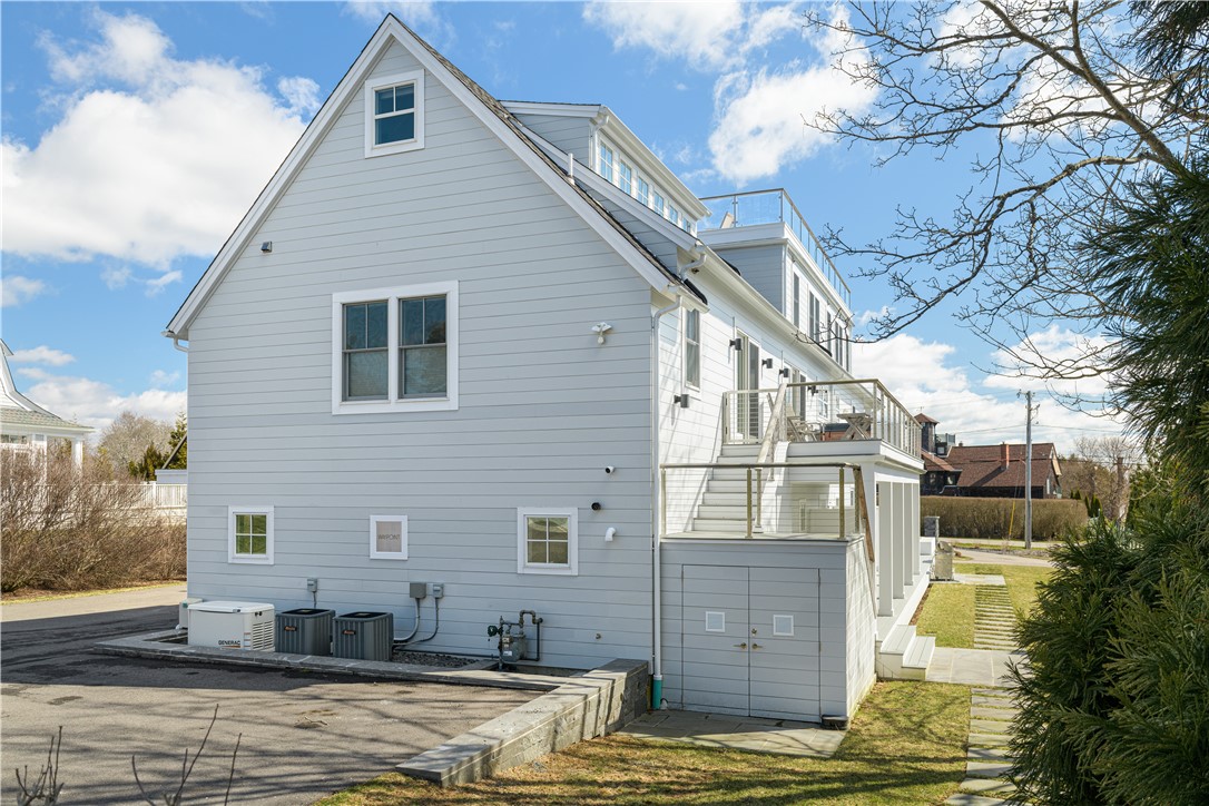 592 Tuckerman Avenue Middletown, RI 02842 - Photo 46 of 50 Back of house with extra storage room.