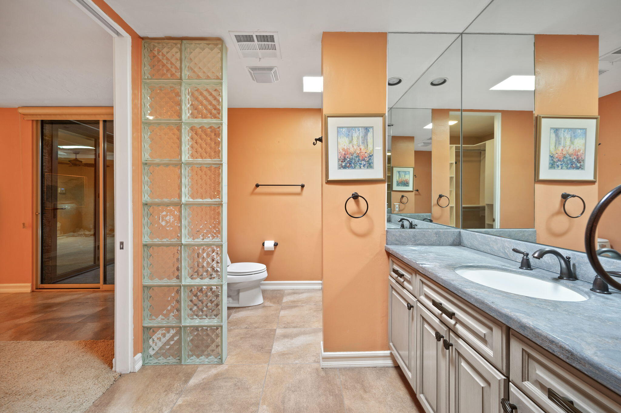 77675 Seminole Road Indian Wells, CA 92210 - Photo 23 of 40 a bathroom with a granite countertop sink a toilet and shower