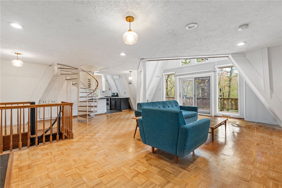 535 Log Road Smithfield, RI 02917 - Photo 12 of 48 With view to lower level spiral staircase