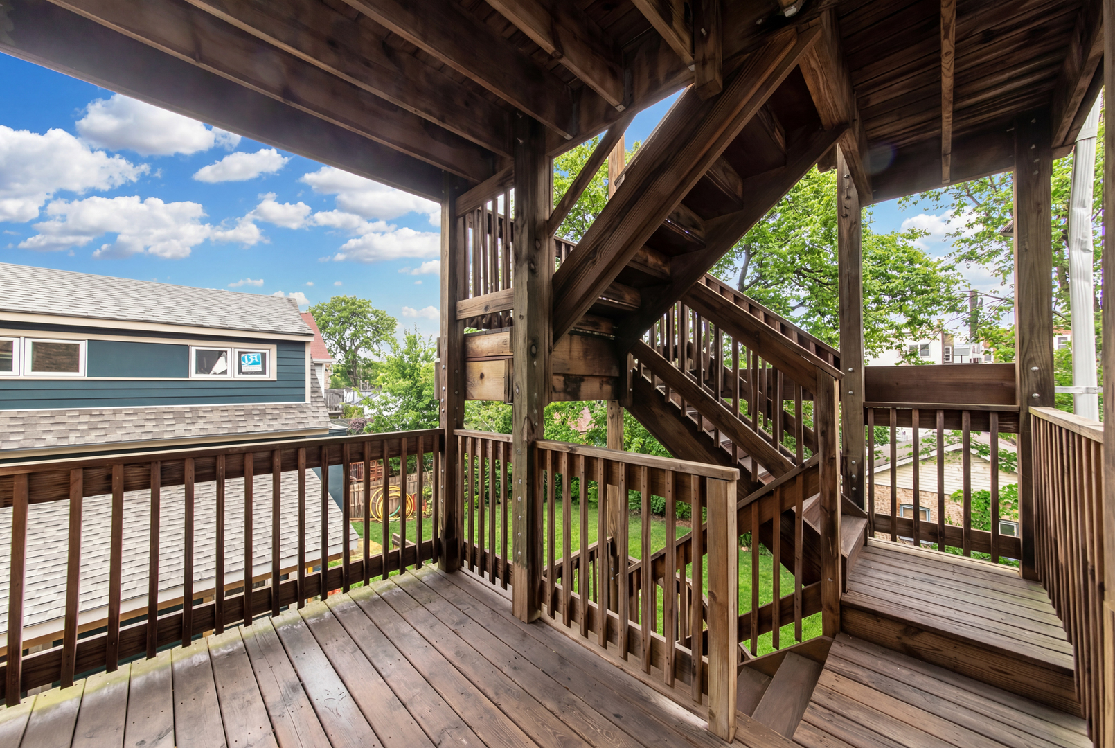 4117 North Paulina Street Chicago, IL 60613 - Photo 6 of 28 a view of porch with wooden floor