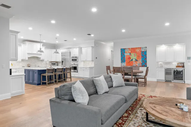 a view of a dining room with furniture and a livingroom
