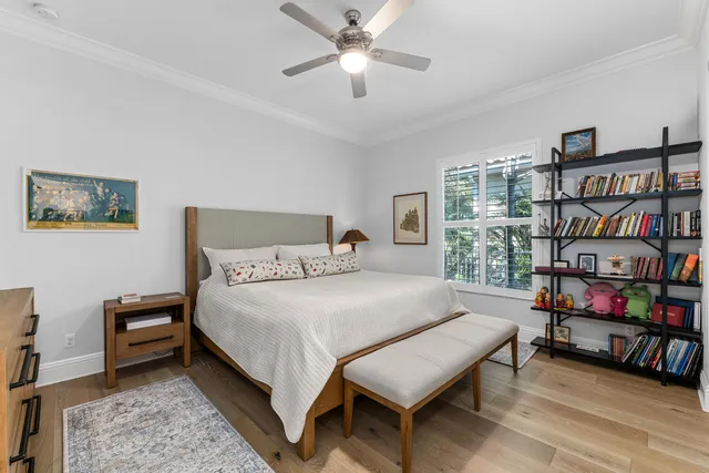 a bathroom with a granite countertop sink a toilet and bathtub