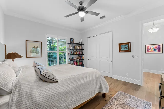 a kitchen with stainless steel appliances cabinets and a window