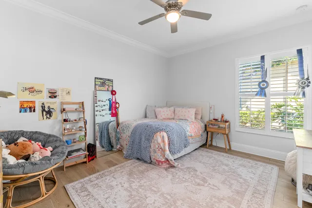 a view of a patio with table and chairs and wooden floor