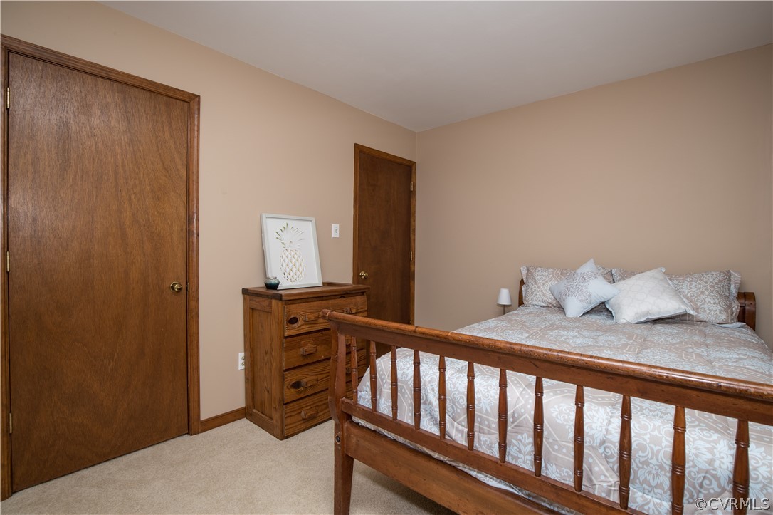 2830 Iverson Road Midlothian, VA 23112 - Photo 17 of 33 1 of 2 downstairs bedrooms. Newer carpet, recent