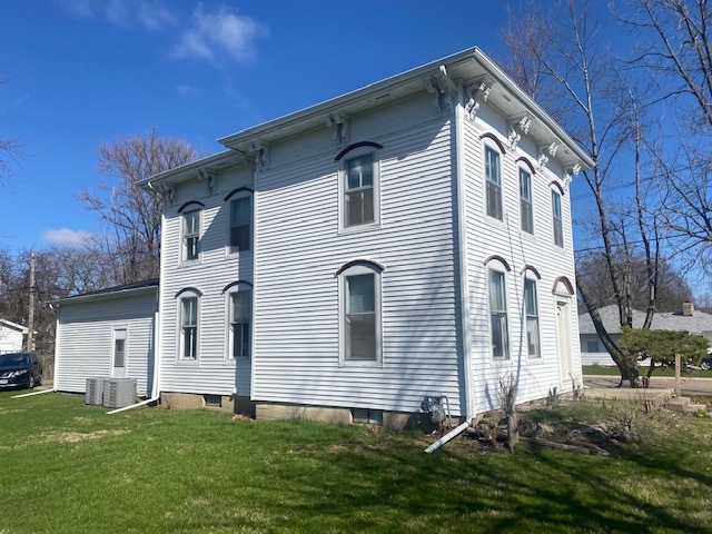 930 North Main Street Rochelle, IL 61068 - Photo 2 of 18 a front view of a house with a yard