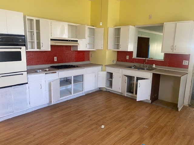 930 North Main Street Rochelle, IL 61068 - Photo 5 of 18 a kitchen with stainless steel appliances granite countertop a stove a sink and a refrigerator