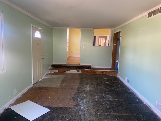 930 North Main Street Rochelle, IL 61068 - Photo 6 of 18 a view of a room with wooden floor and window
