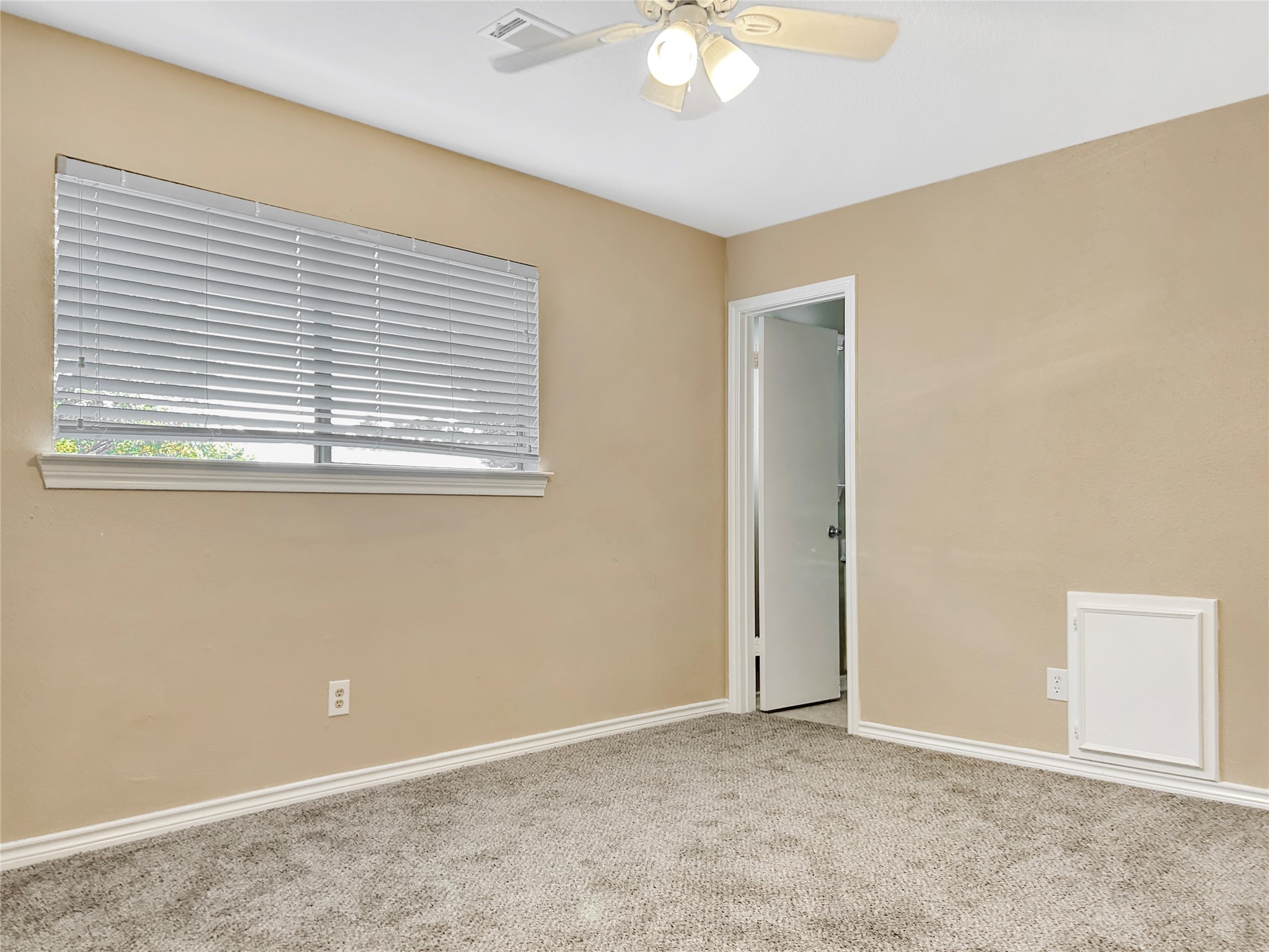 1111 Baker Drive Tomball, TX 77375 - Photo 12 of 16 an empty room with a window