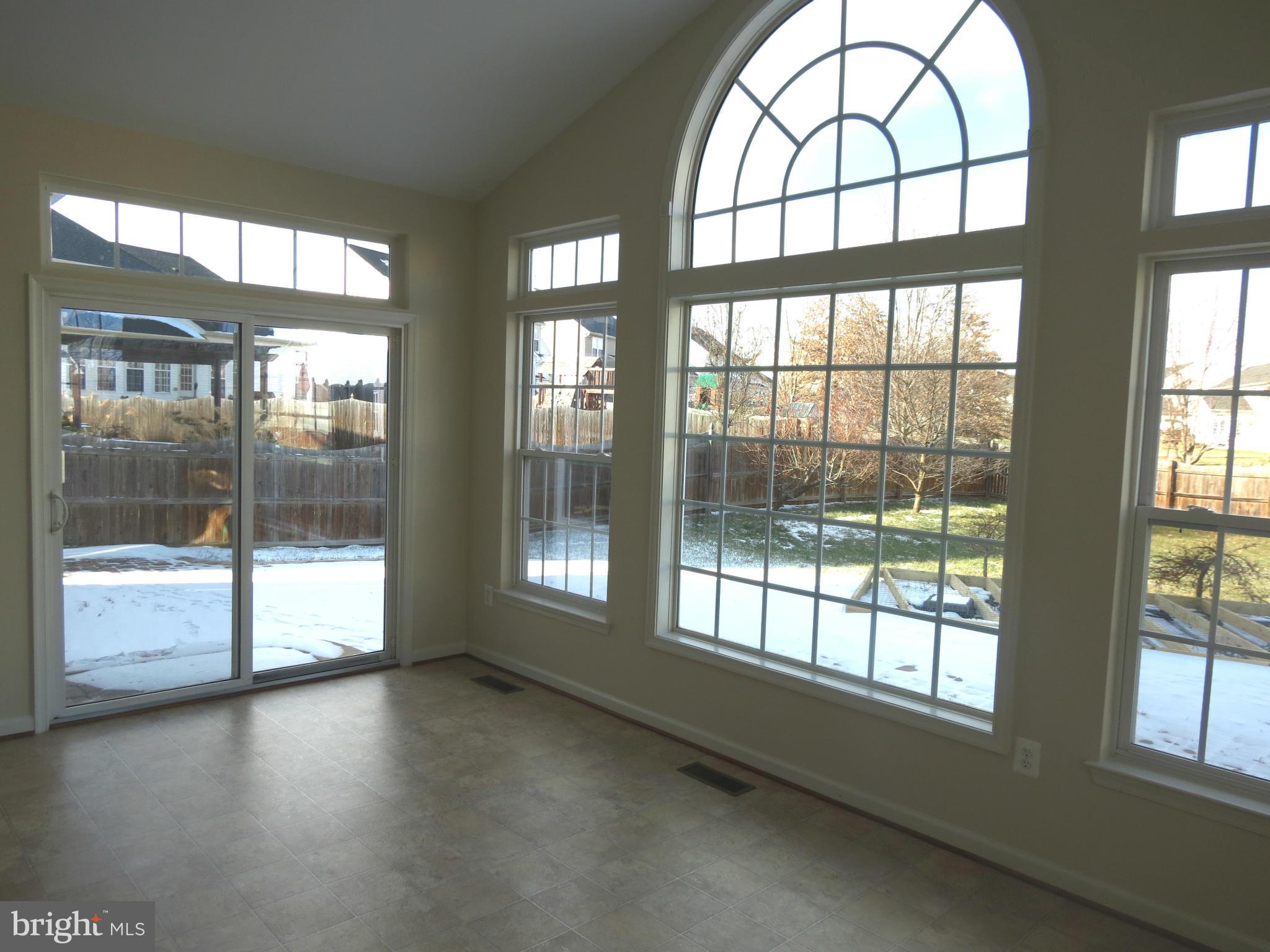 1801 Weybridge Road Frederick, MD 21702 - Photo 11 of 27 Sun Room w/Wall of Windows
