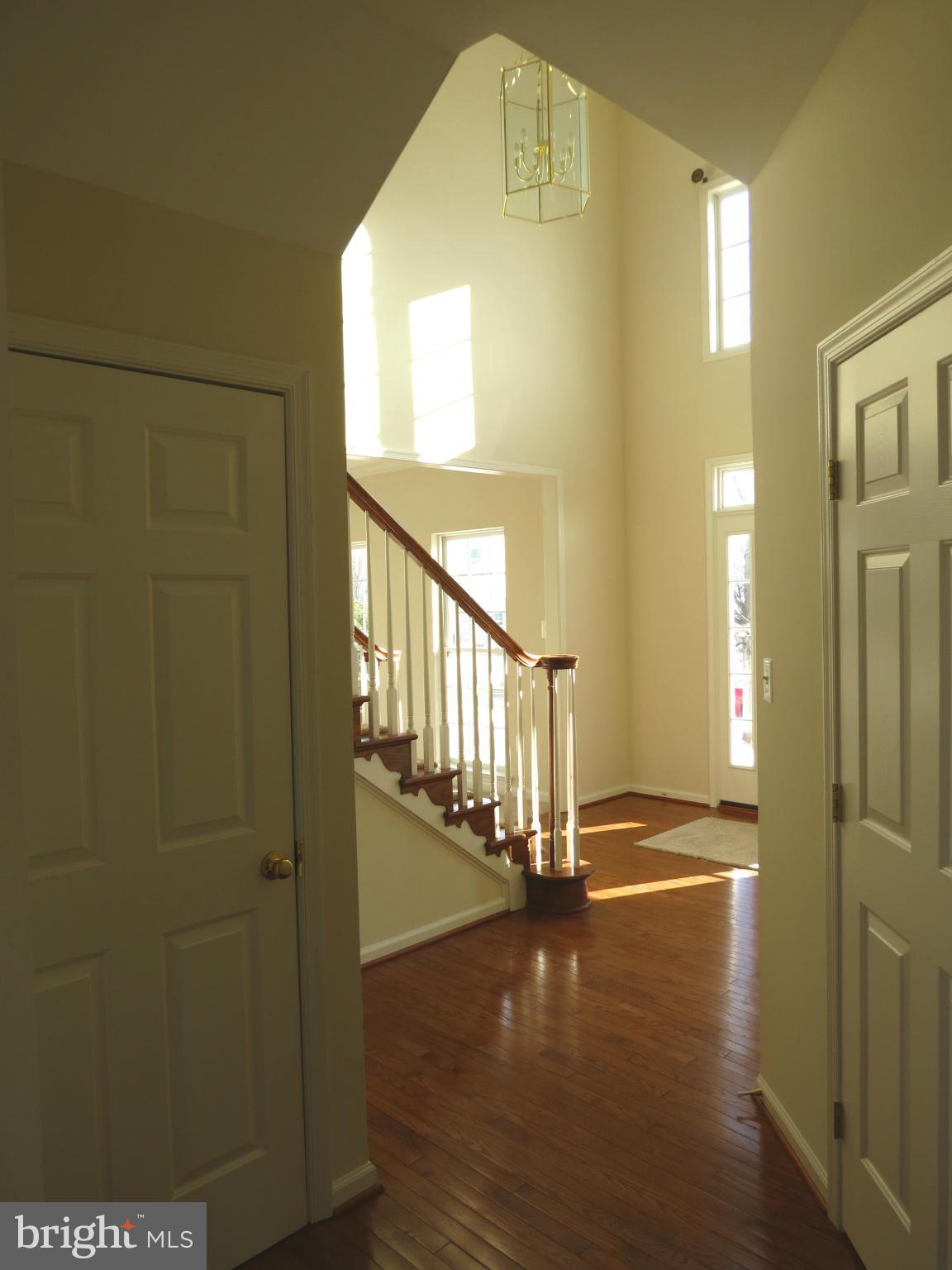 1801 Weybridge Road Frederick, MD 21702 - Photo 12 of 27 Main Level Hallway w/Hardwoods