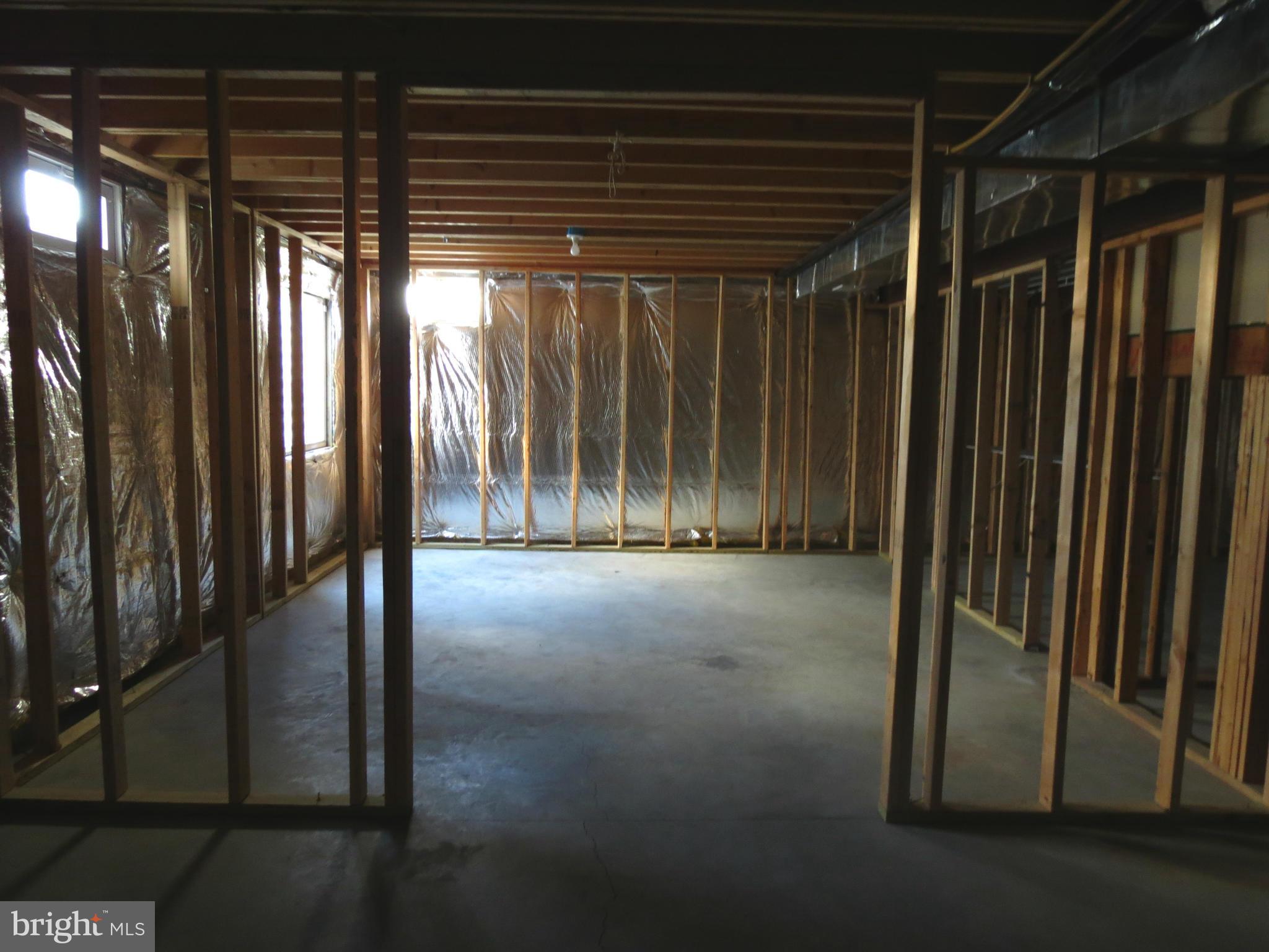 1801 Weybridge Road Frederick, MD 21702 - Photo 25 of 27 Unfinished Basement Framed For 5th Bedrrom