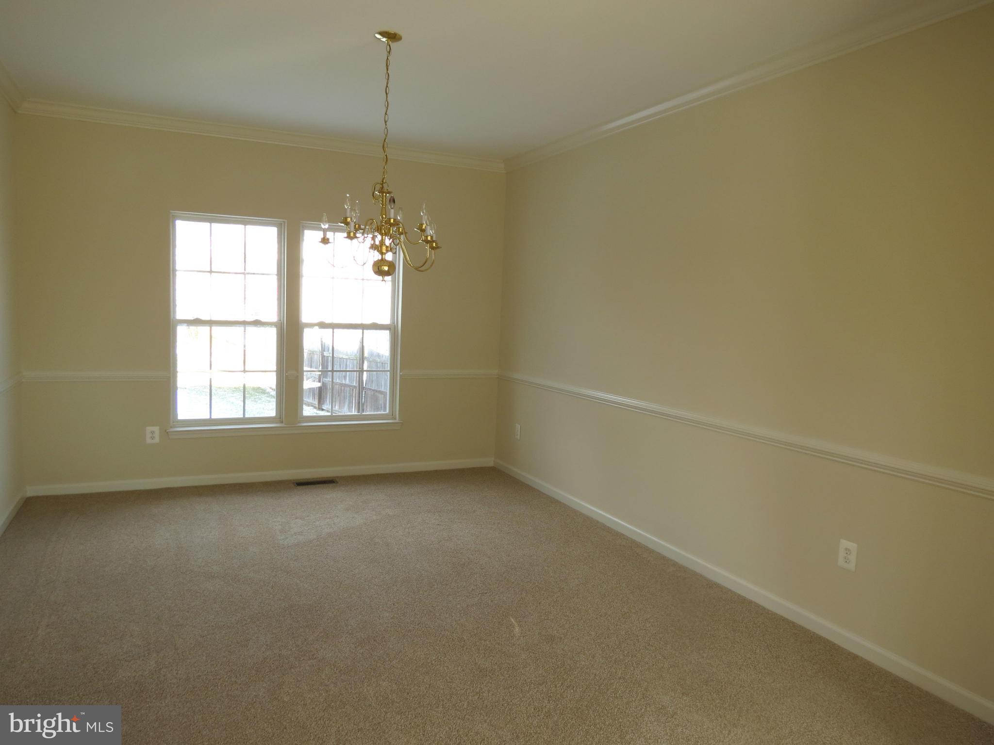 Dining Room w/Crown Molding and Chair Rail