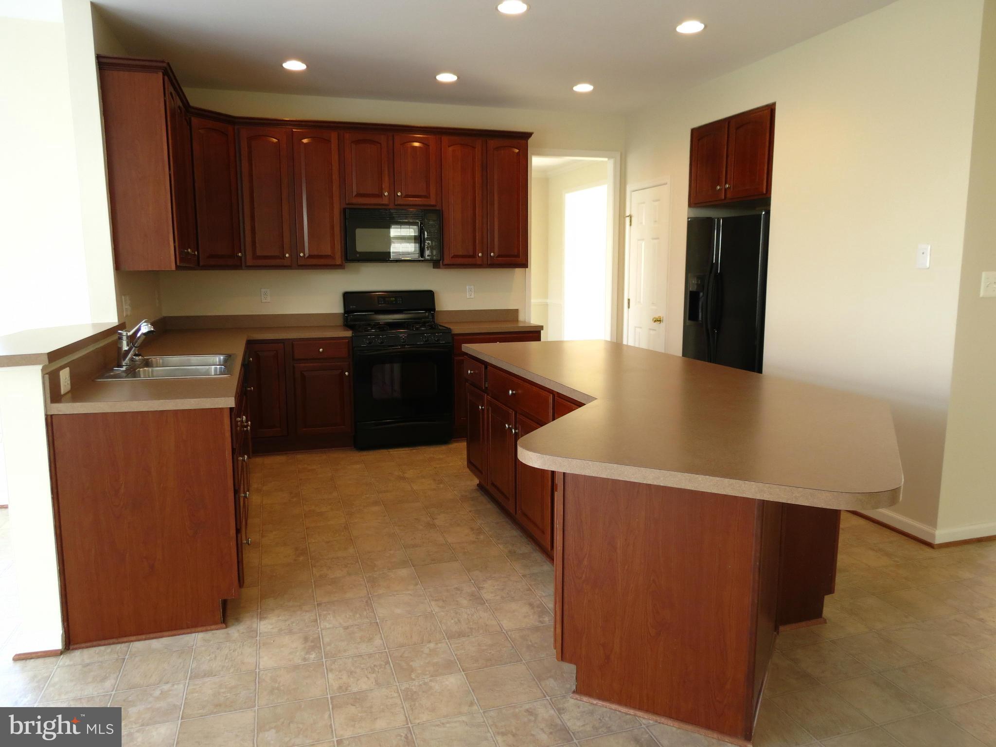 1801 Weybridge Road Frederick, MD 21702 - Photo 9 of 27 Kitchen w/Upgraded Cabinets