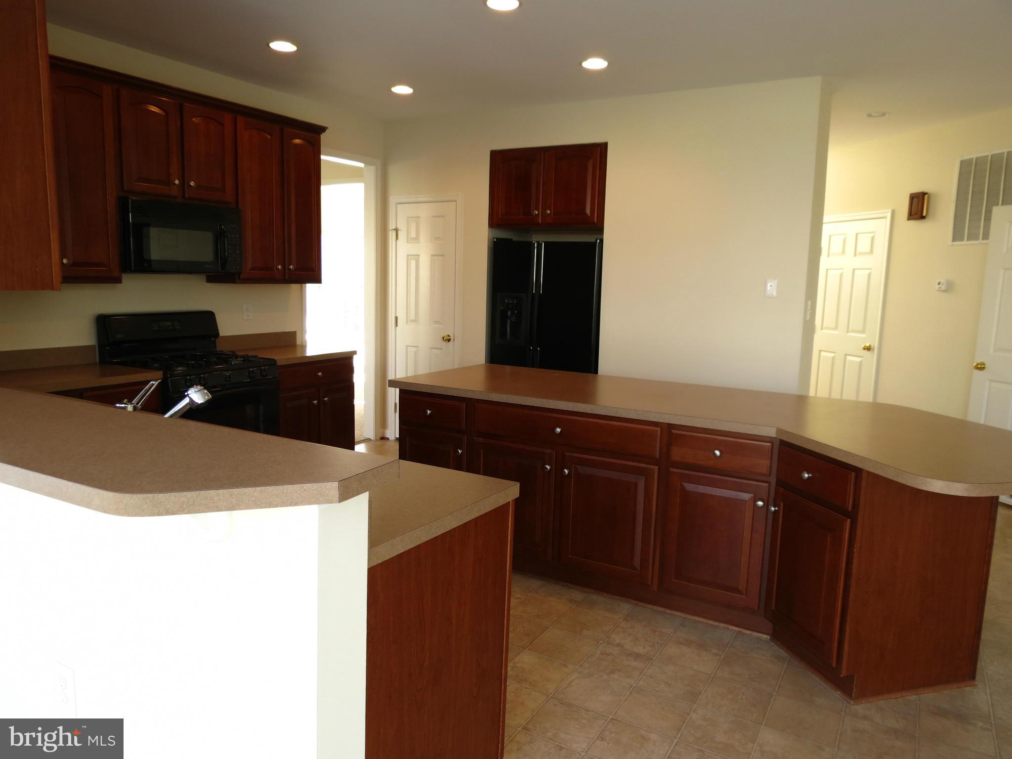 1801 Weybridge Road Frederick, MD 21702 - Photo 10 of 27 Kitchen w/Center Island