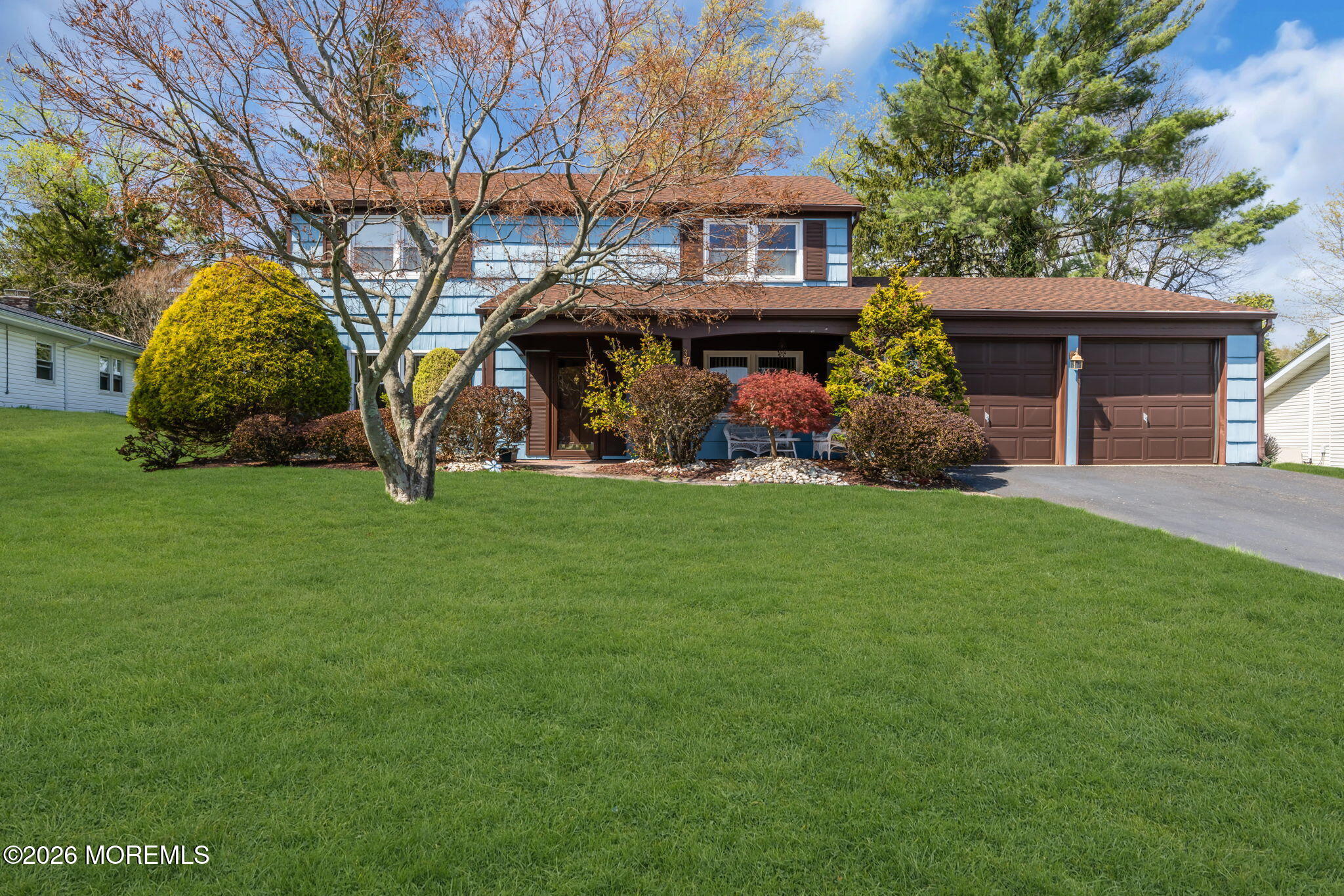 37 Faith Lane Aberdeen, NJ 07747 - Photo 4 of 36 a view of a house with a yard and sitting area