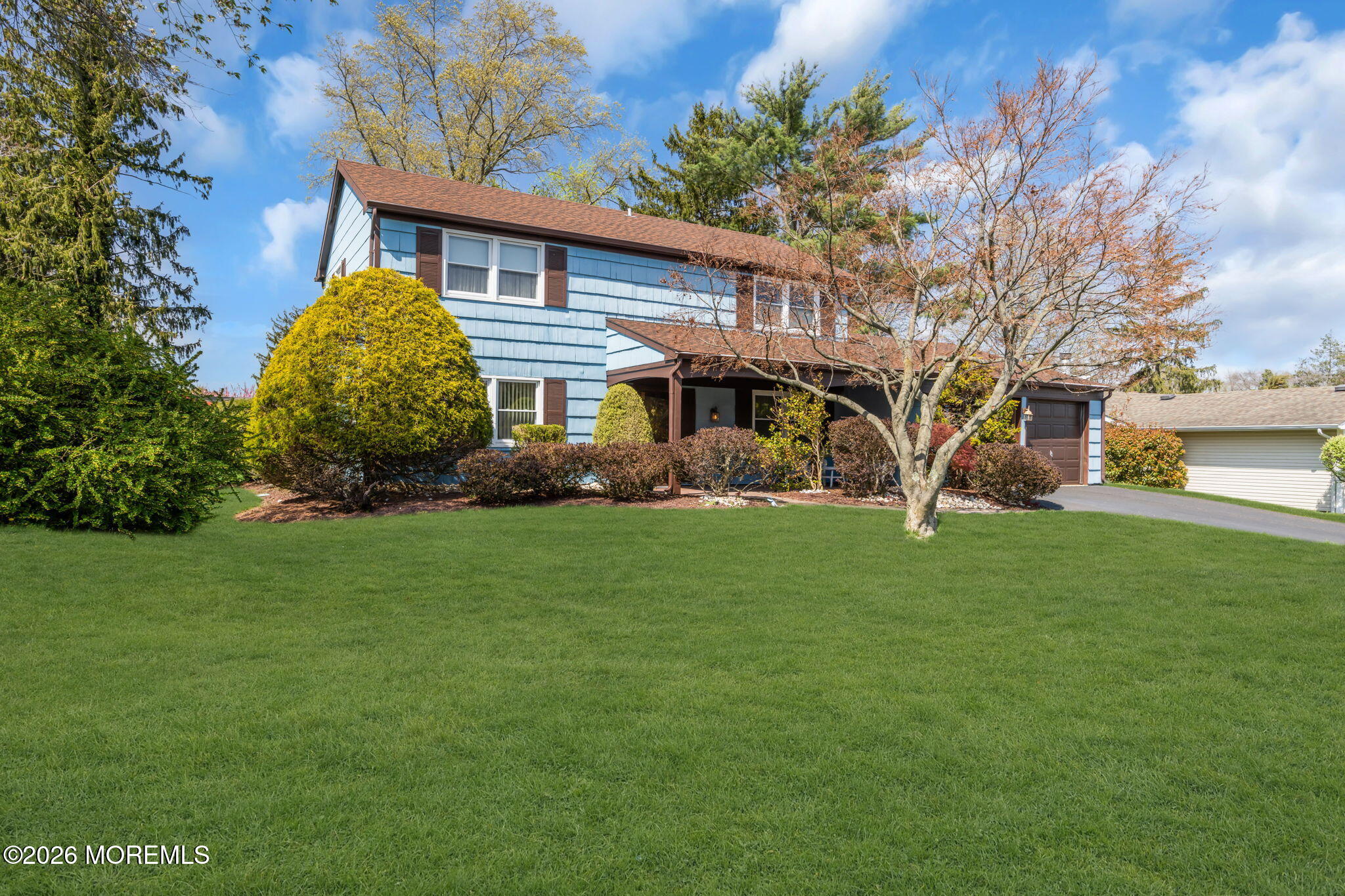 37 Faith Lane Aberdeen, NJ 07747 - Photo 6 of 36 a front view of a house with garden