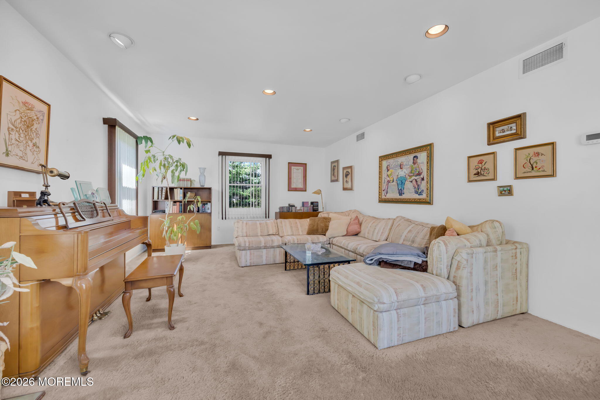 37 Faith Lane Aberdeen, NJ 07747 - Photo 10 of 36 a living room with furniture and a wooden floor