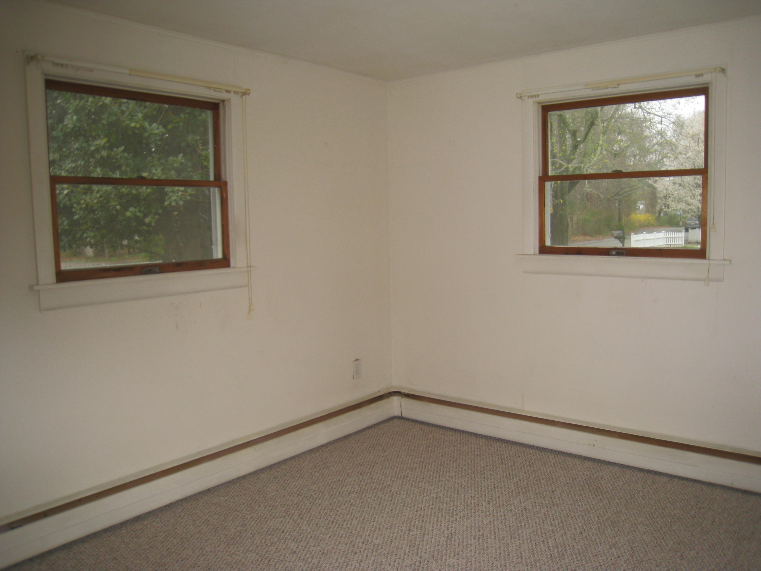 34 Tevyaw Road Hyannis, MA 02601 - Photo 13 of 28 an empty room with a window