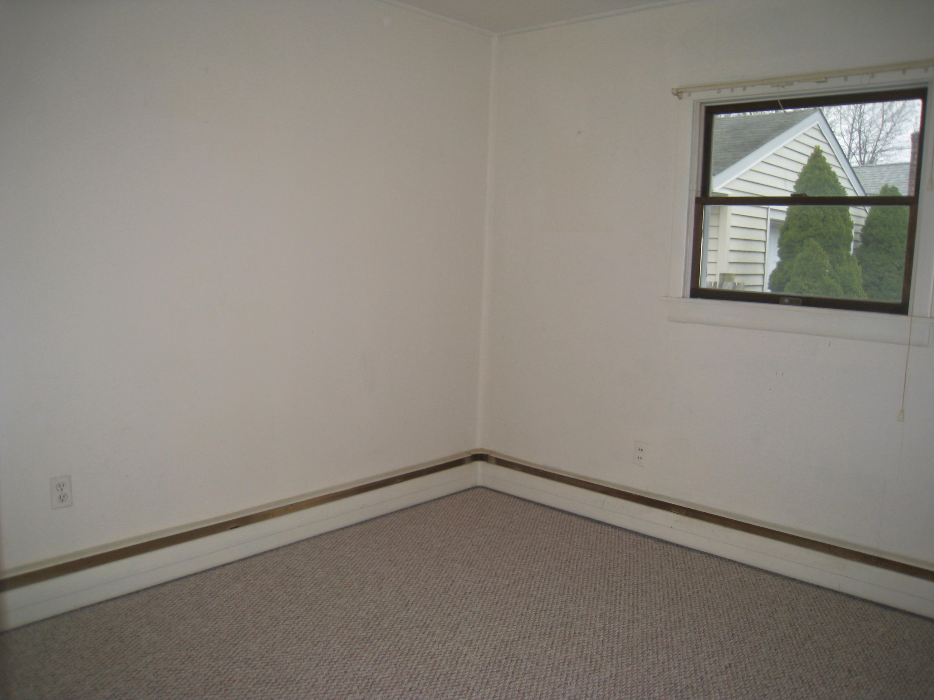 34 Tevyaw Road Hyannis, MA 02601 - Photo 17 of 28 an empty room with a window
