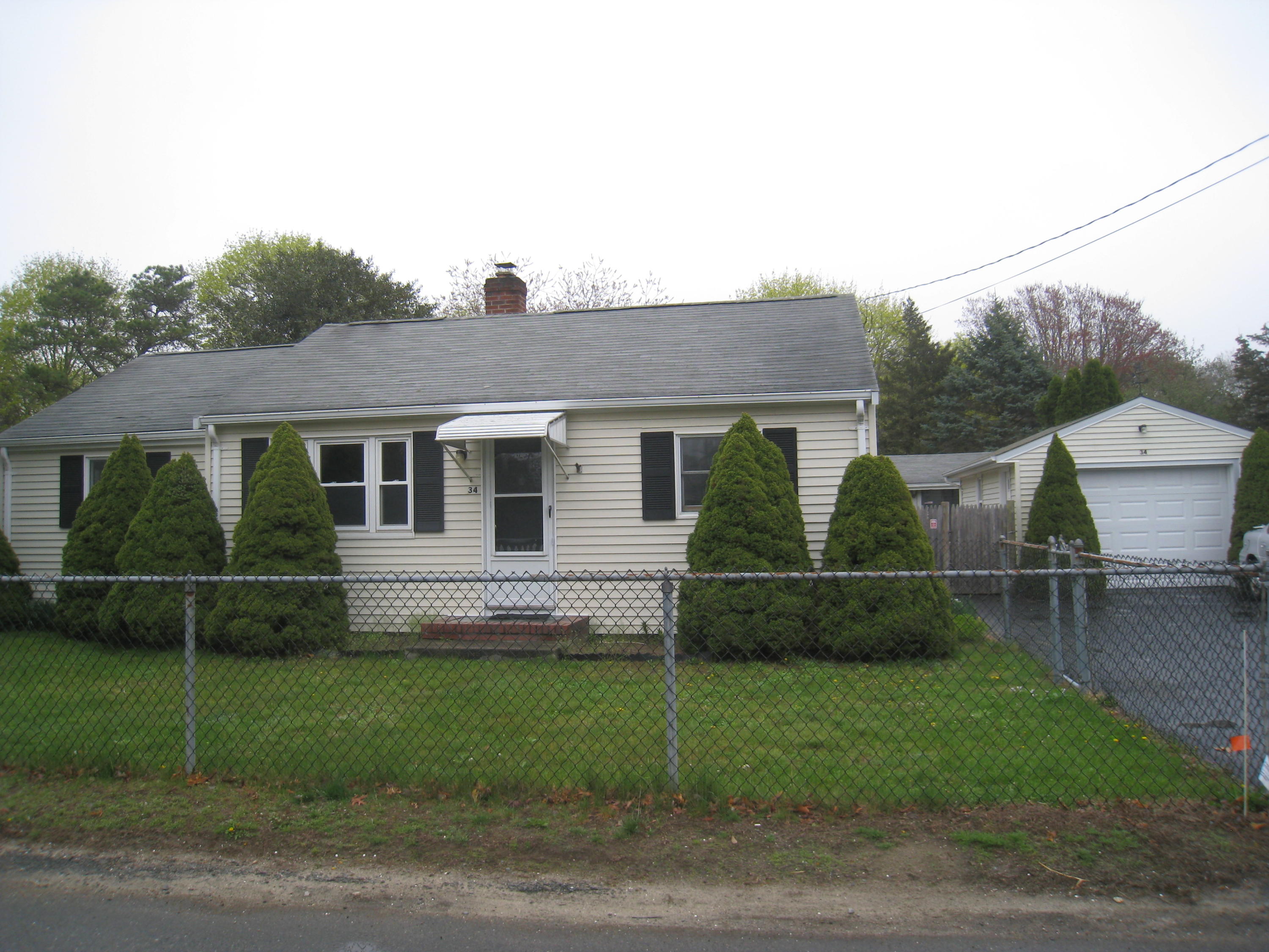 34 Tevyaw Road Hyannis, MA 02601 - Photo 27 of 28 a front view of house with yard and outdoor seating