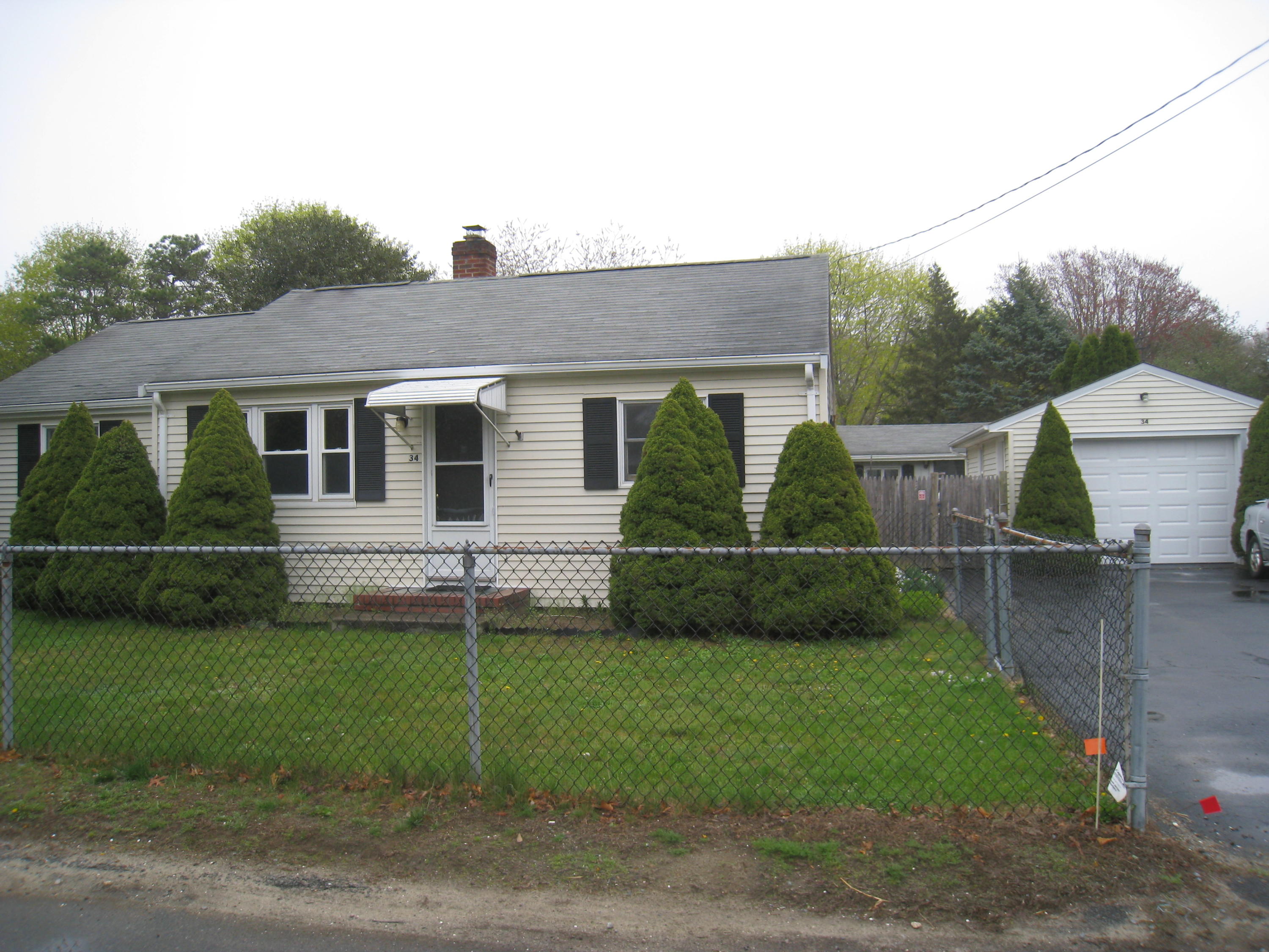 34 Tevyaw Road Hyannis, MA 02601 - Photo 28 of 28 a view of a house with a backyard