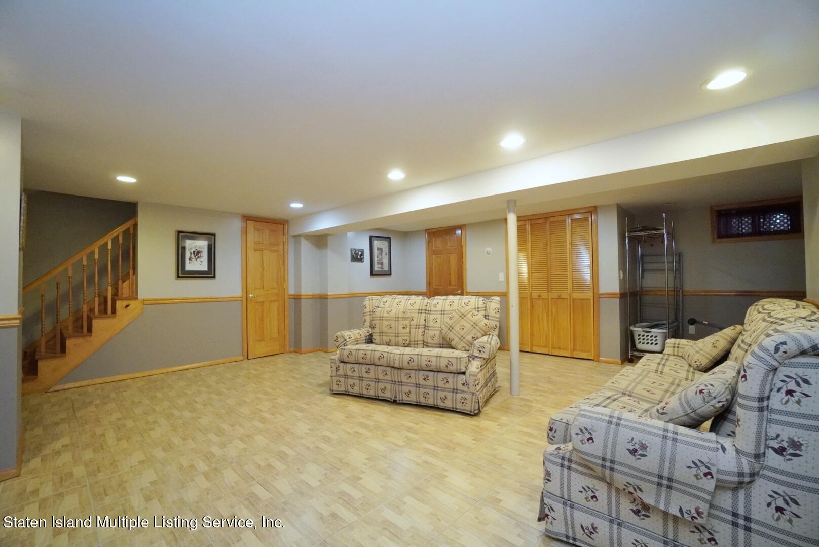 111 Medford Road Staten Island, NY 10304 - Photo 24 of 35 (24) FULL FINISHED BASEMENT