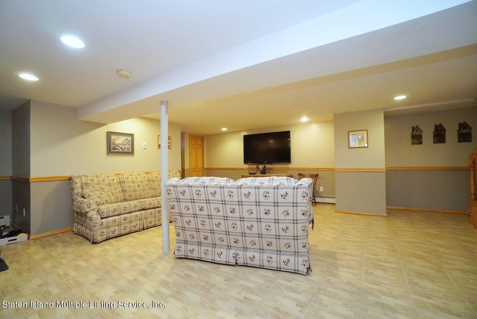 111 Medford Road Staten Island, NY 10304 - Photo 25 of 35 (25) FULL FINISHED BASEMENT