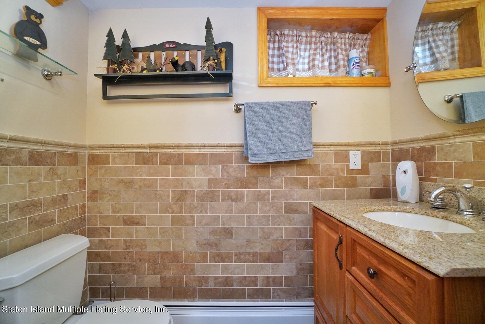 111 Medford Road Staten Island, NY 10304 - Photo 26 of 35 (26) BASEMENT HALF BATH