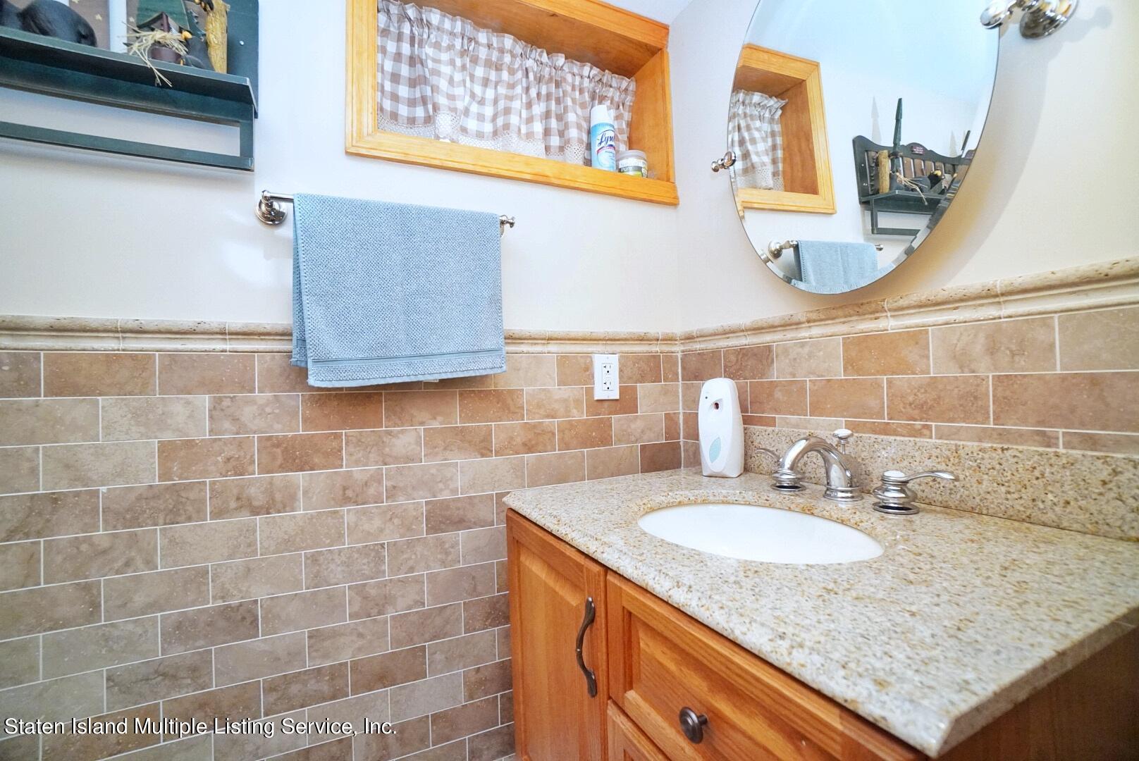 111 Medford Road Staten Island, NY 10304 - Photo 27 of 35 (27) BASEMENT HALF BATH