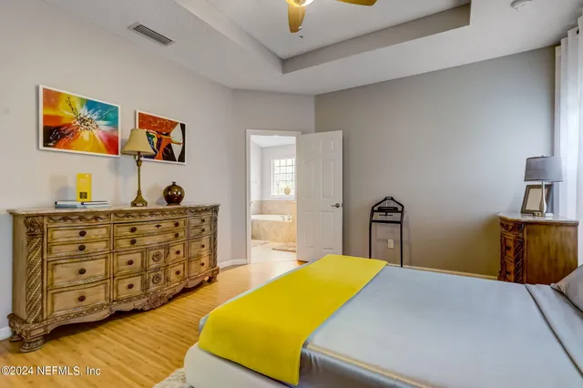 a bedroom with a bed and furniture