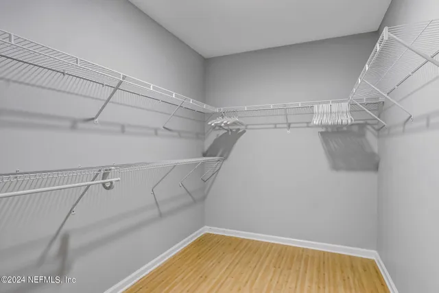 a view of a room with racks on the wall