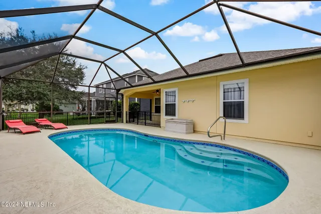 a view of outdoor space yard swimming pool and porch