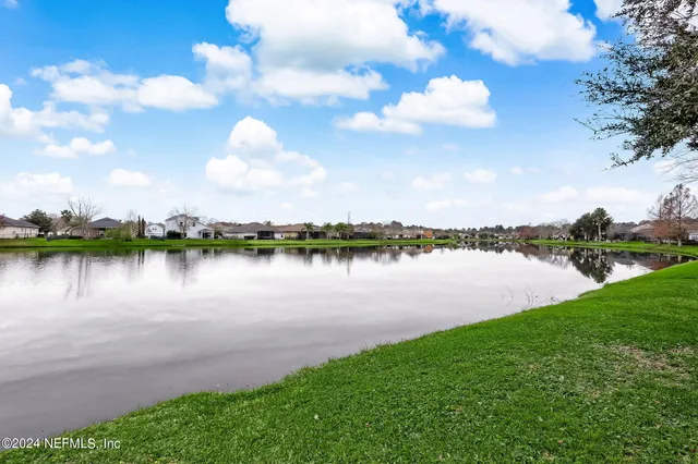 a view of a lake with houses