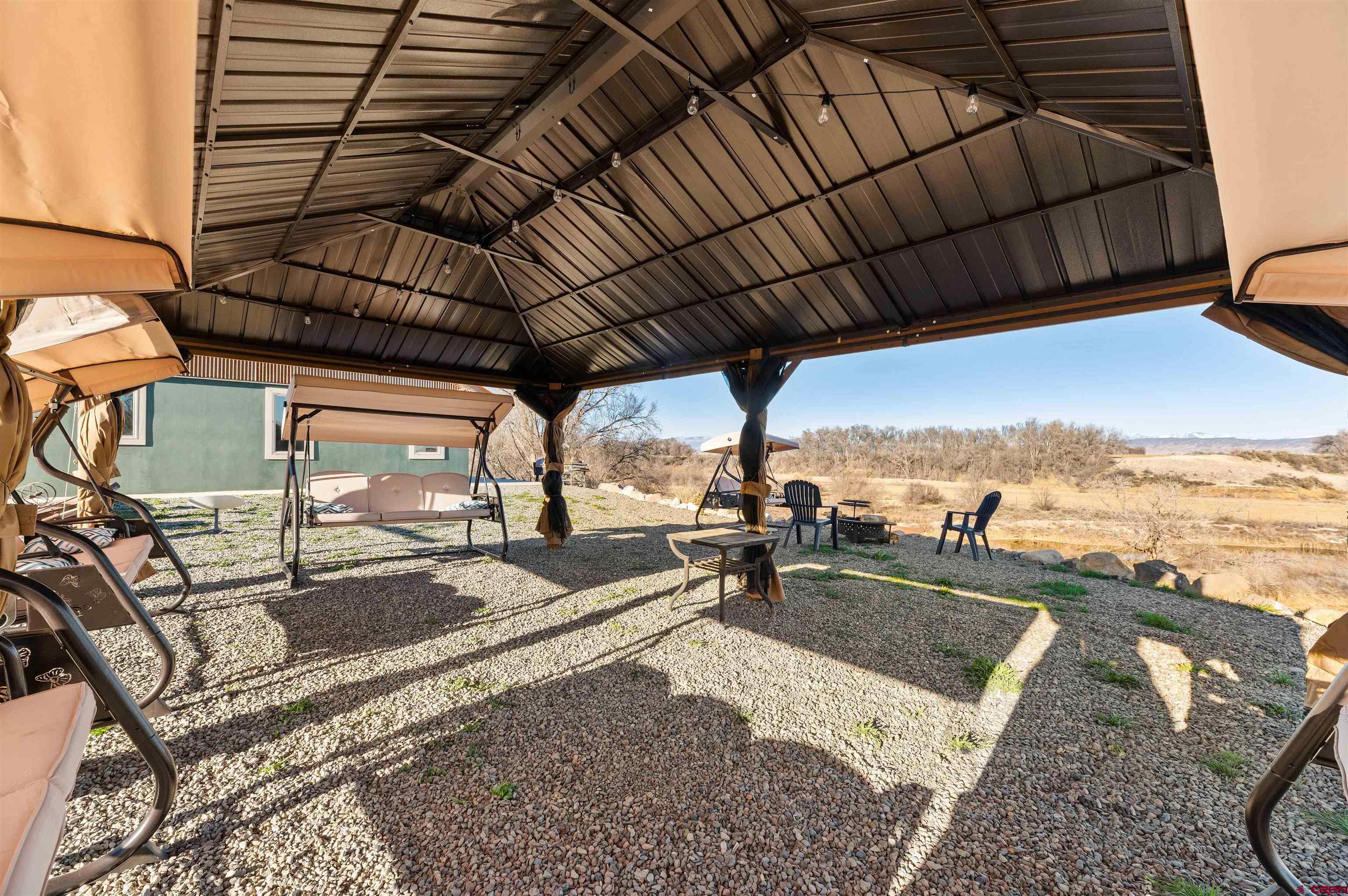 55347 Begonia Road Delta, CO 81416 - Photo 41 of 44 a view of a backyard with sitting area