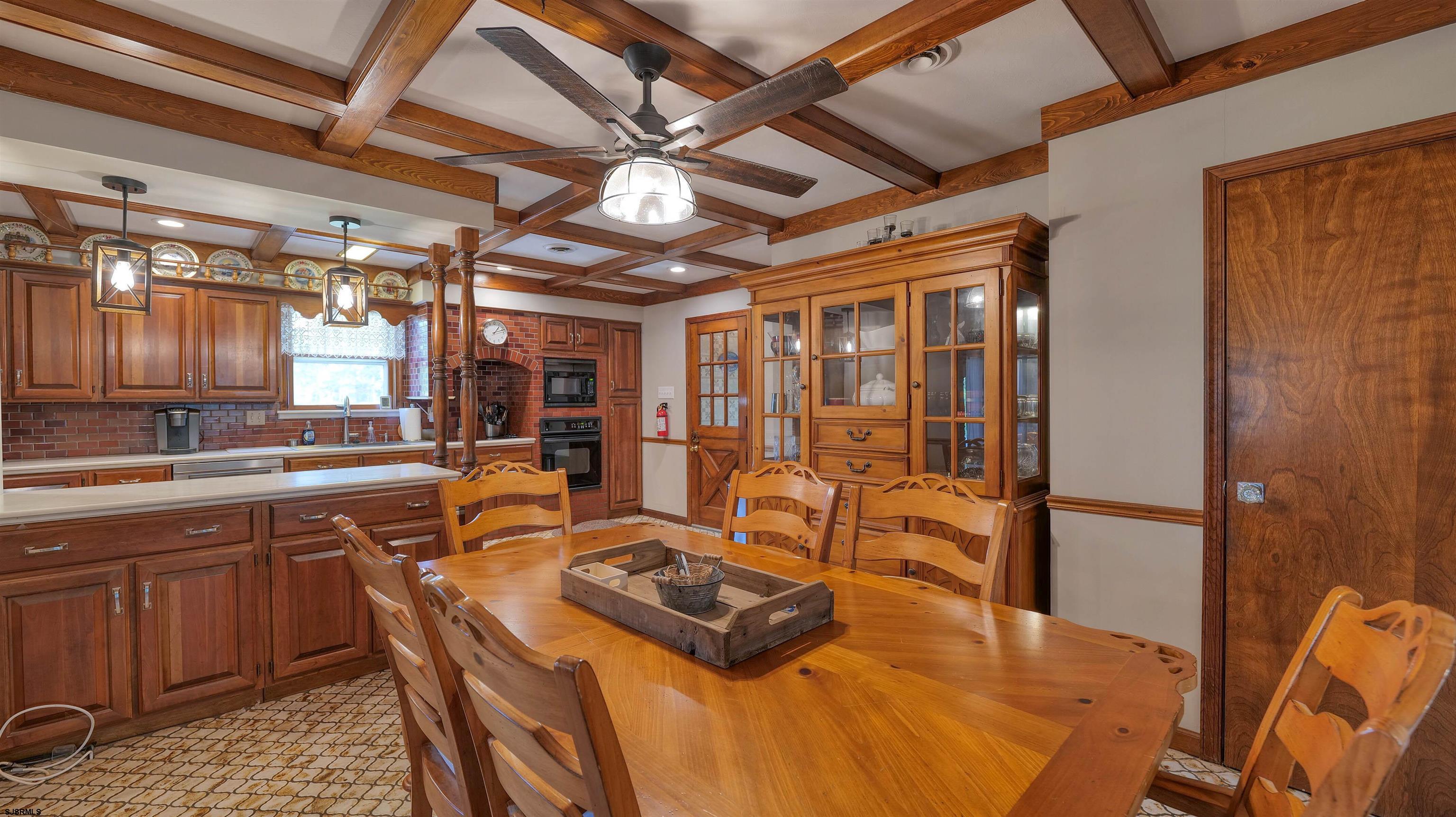 328 Llewellyn Avenue Richland, NJ 08350 - Photo 15 of 44 a kitchen with stainless steel appliances granite countertop a sink a stove and a refrigerator