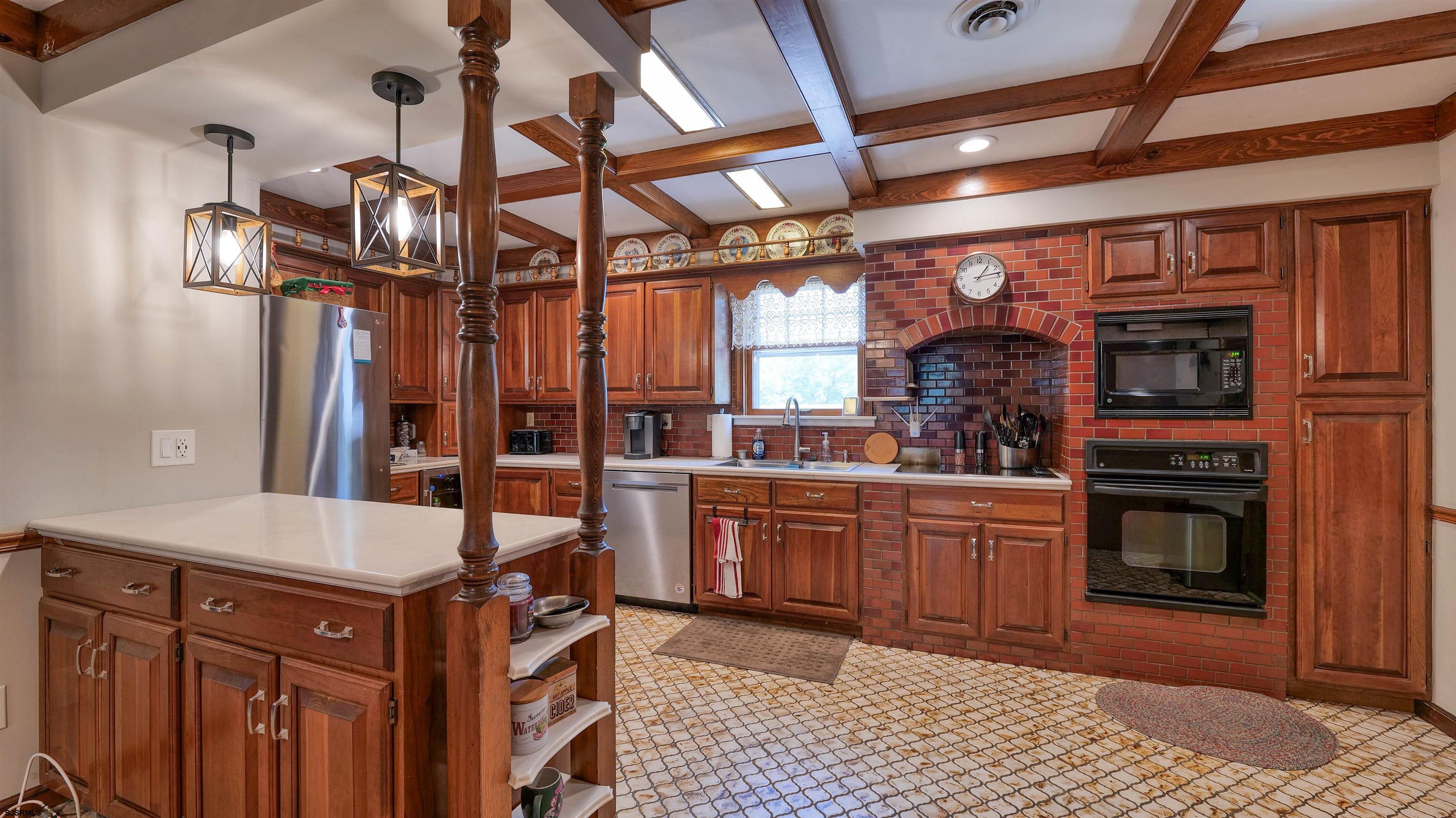 328 Llewellyn Avenue Richland, NJ 08350 - Photo 17 of 44 a kitchen with stainless steel appliances granite countertop a stove and cabinets