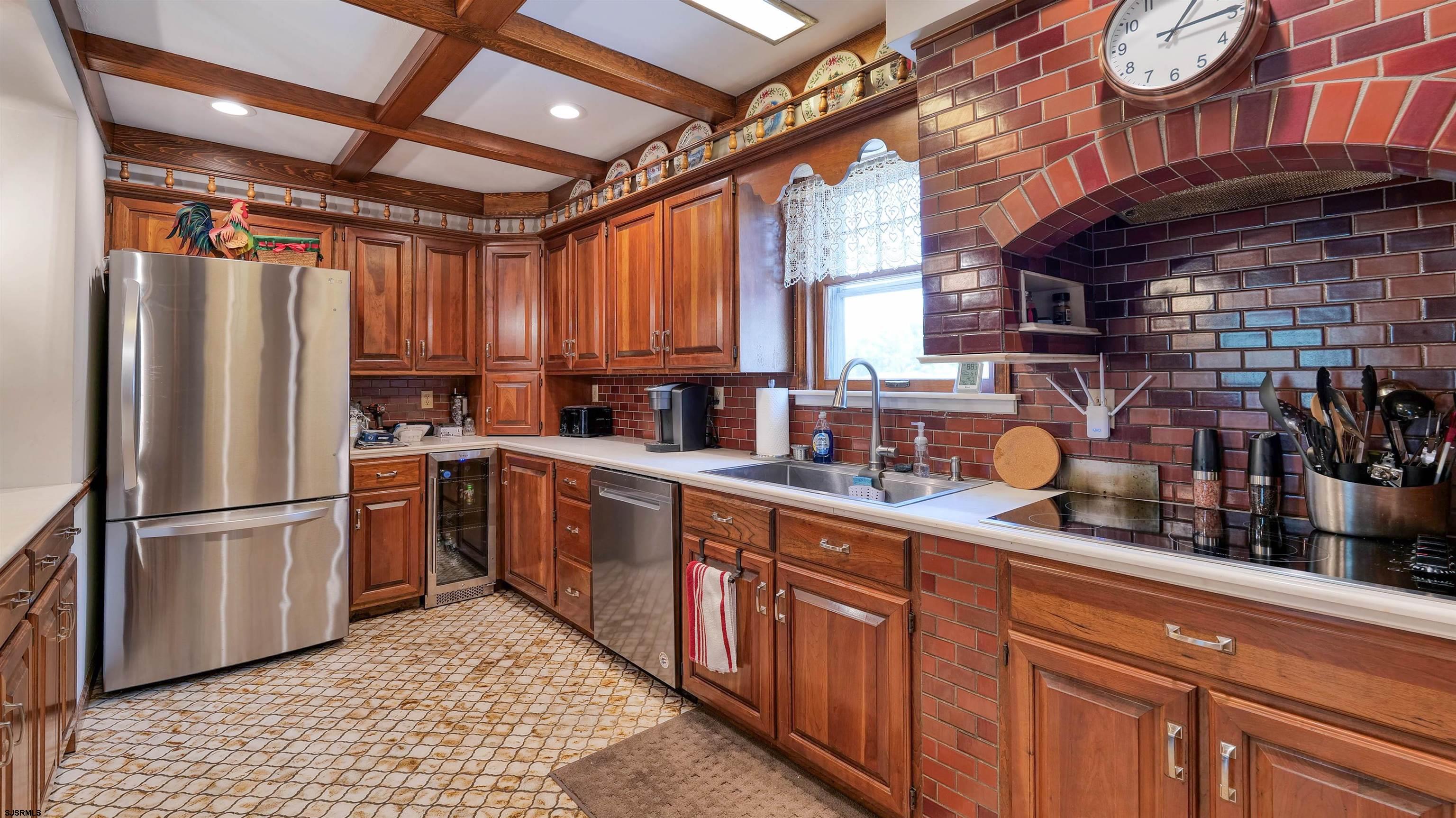 328 Llewellyn Avenue Richland, NJ 08350 - Photo 19 of 44 a kitchen with stainless steel appliances granite countertop a refrigerator a sink a stove and dishwasher