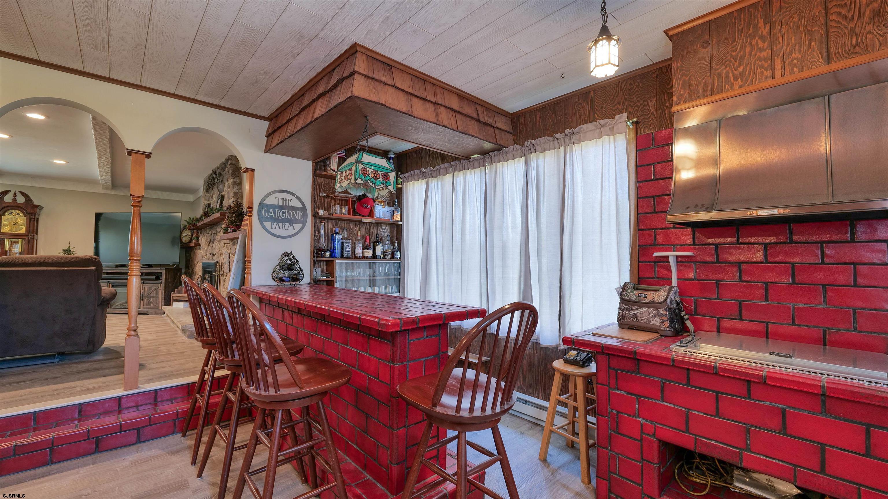 328 Llewellyn Avenue Richland, NJ 08350 - Photo 22 of 44 a outdoor dining space with furniture and a potted plant