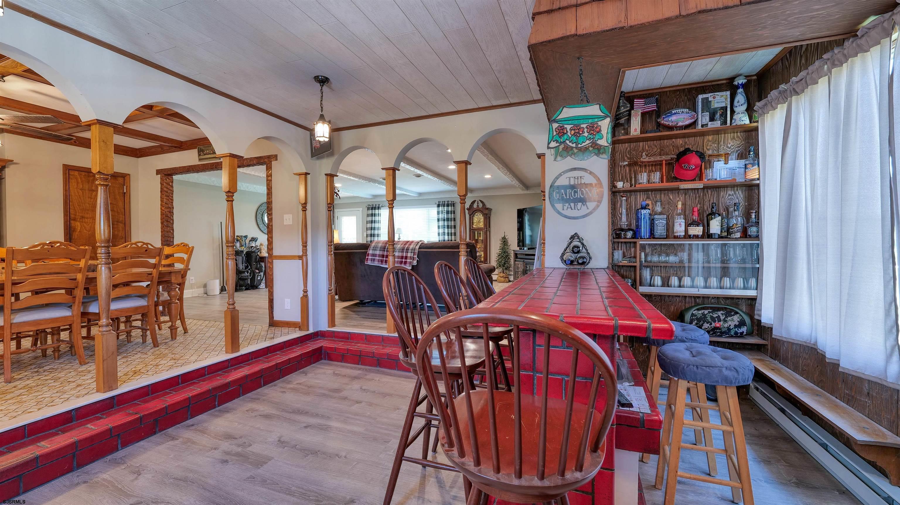 328 Llewellyn Avenue Richland, NJ 08350 - Photo 23 of 44 a view of a dining room with furniture and a chandelier
