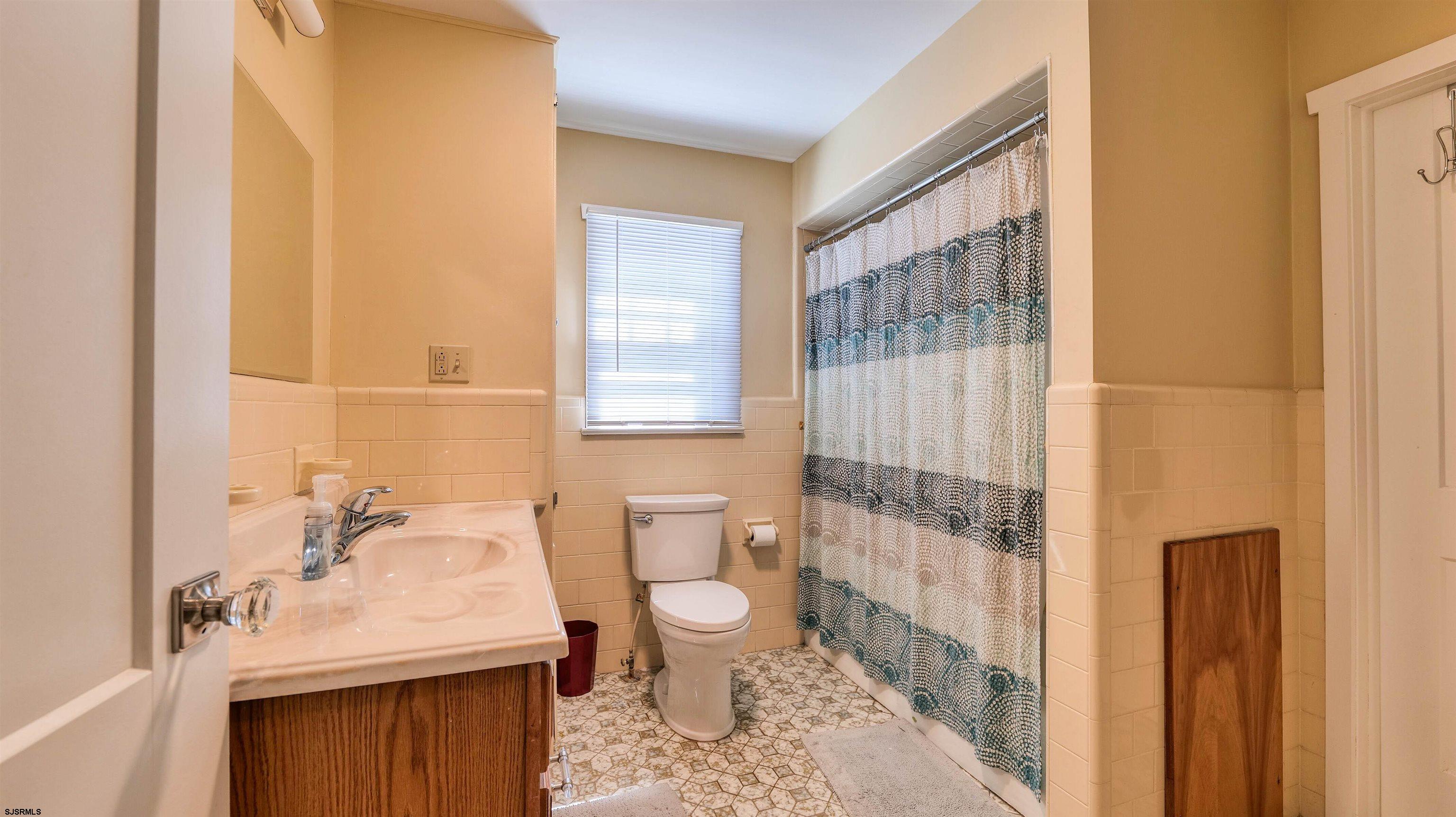 328 Llewellyn Avenue Richland, NJ 08350 - Photo 26 of 44 a bathroom with a sink toilet vanity and shower