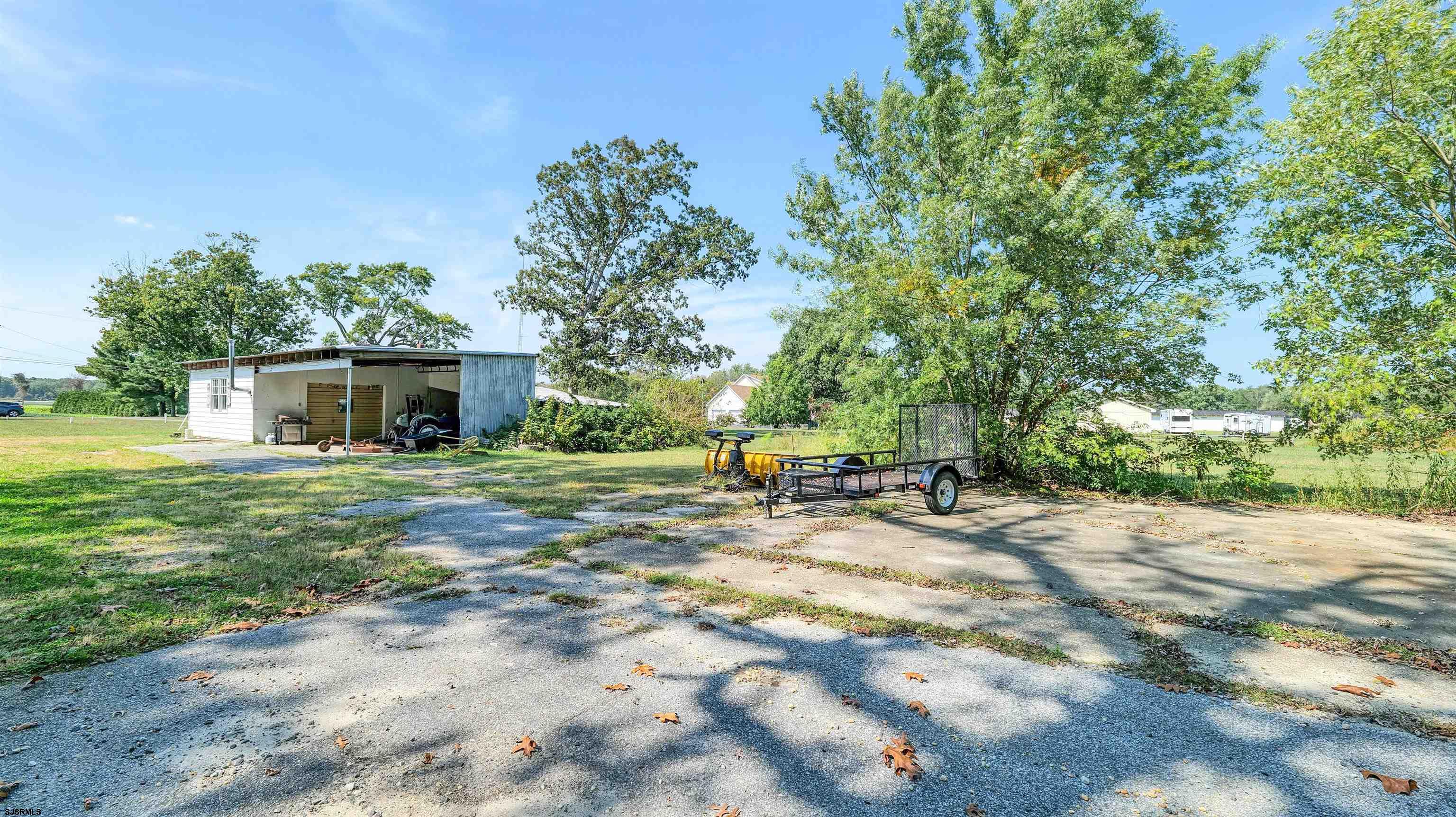 328 Llewellyn Avenue Richland, NJ 08350 - Photo 38 of 44 a view of a house with backyard and sitting area