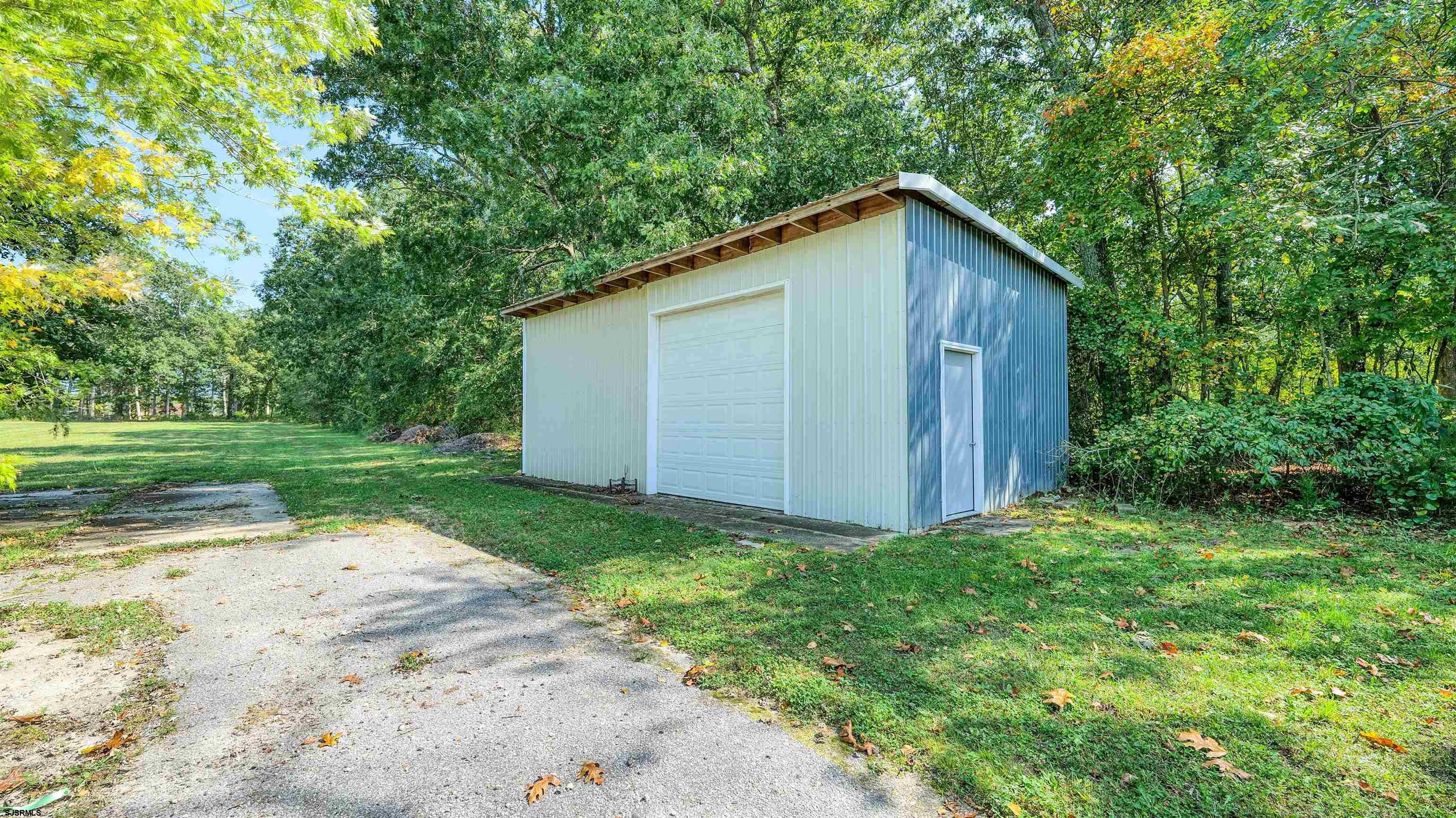 328 Llewellyn Avenue Richland, NJ 08350 - Photo 40 of 44 a view of a backyard with barn