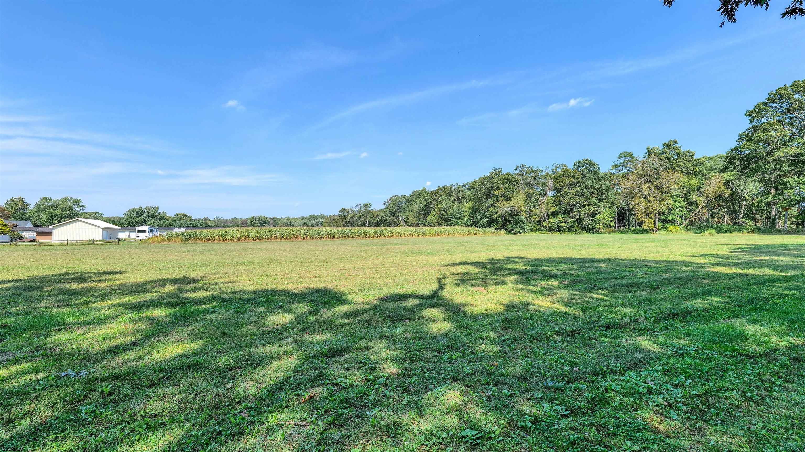 328 Llewellyn Avenue Richland, NJ 08350 - Photo 42 of 44 a view of a lake with a big yard