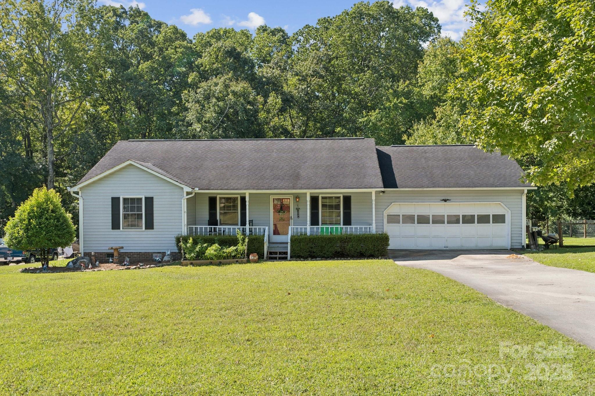 1106 Birch Street Salisbury, NC 28146 - Photo 1 of 48 a view of a house with a big yard and large trees