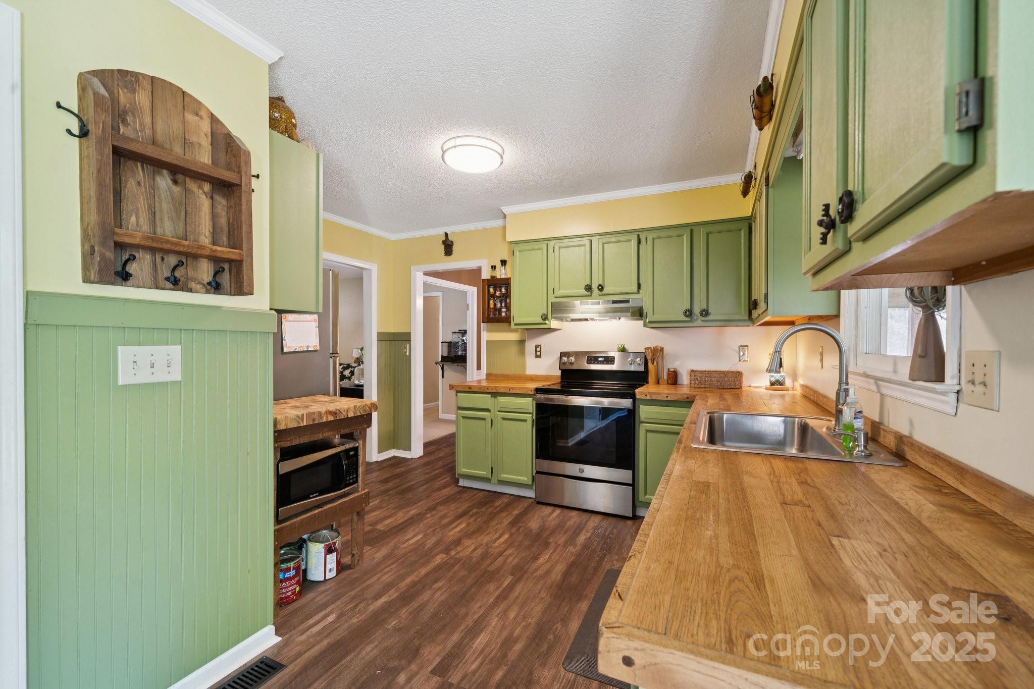 1106 Birch Street Salisbury, NC 28146 - Photo 14 of 48 a kitchen with stainless steel appliances a refrigerator and a stove top oven