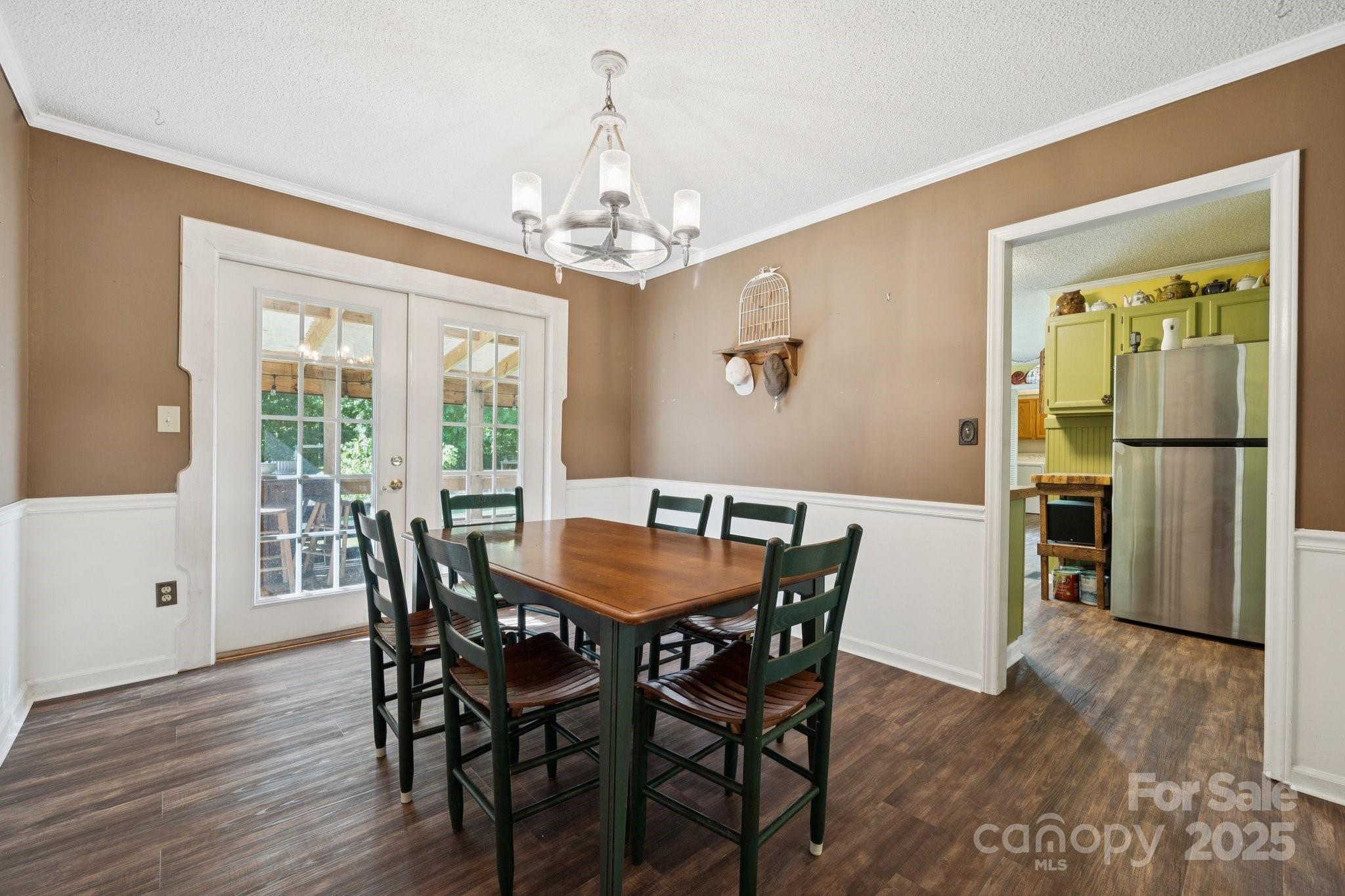 1106 Birch Street Salisbury, NC 28146 - Photo 19 of 48 a view of a dining room with furniture window and wooden floor