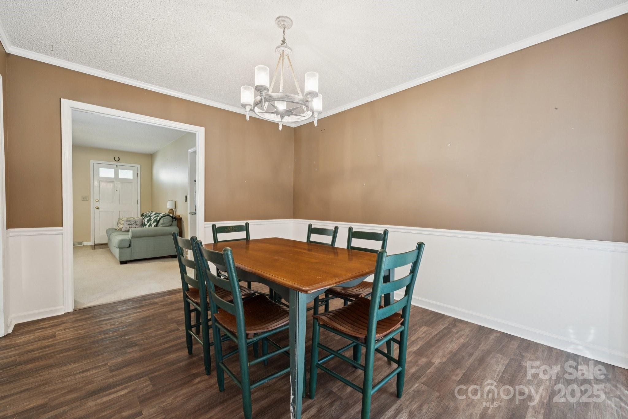 1106 Birch Street Salisbury, NC 28146 - Photo 21 of 48 a view of a dining room with furniture and wooden floor